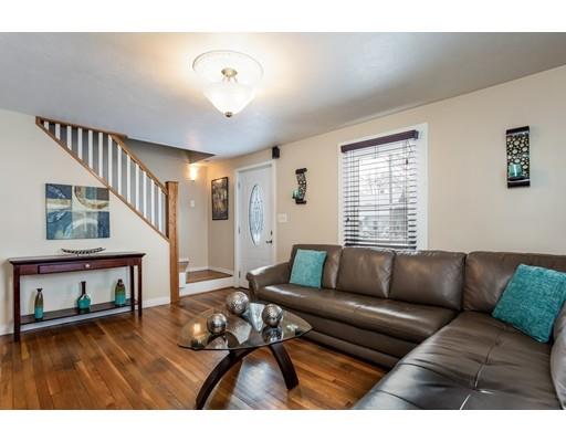 159 Powell Avenue Springfield, MA 01118 - Photo 5 of 30 a living room with furniture and a wooden floor