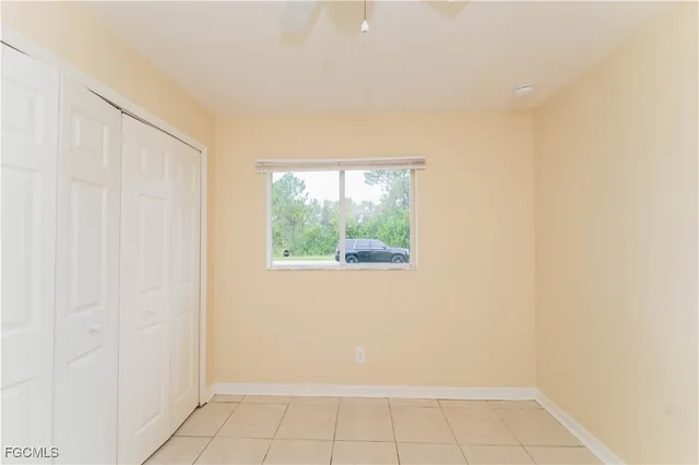 a view of empty room with windows