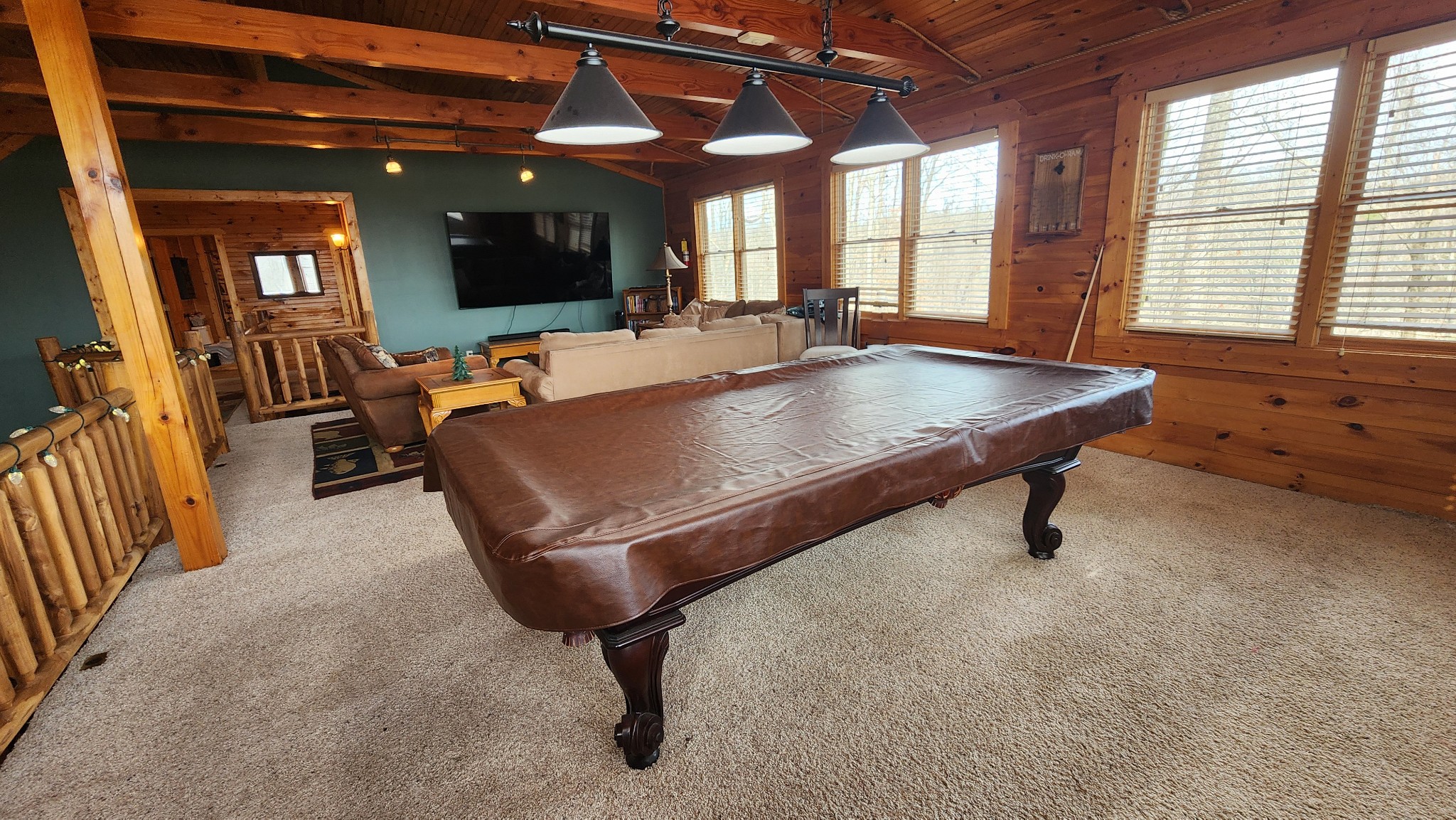 5615 Eastport Road Alpine, TN 38543 - Photo 38 of 83 a dining room with furniture and a flat screen tv