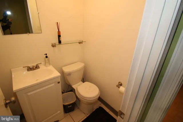 a bathroom with a toilet and a sink