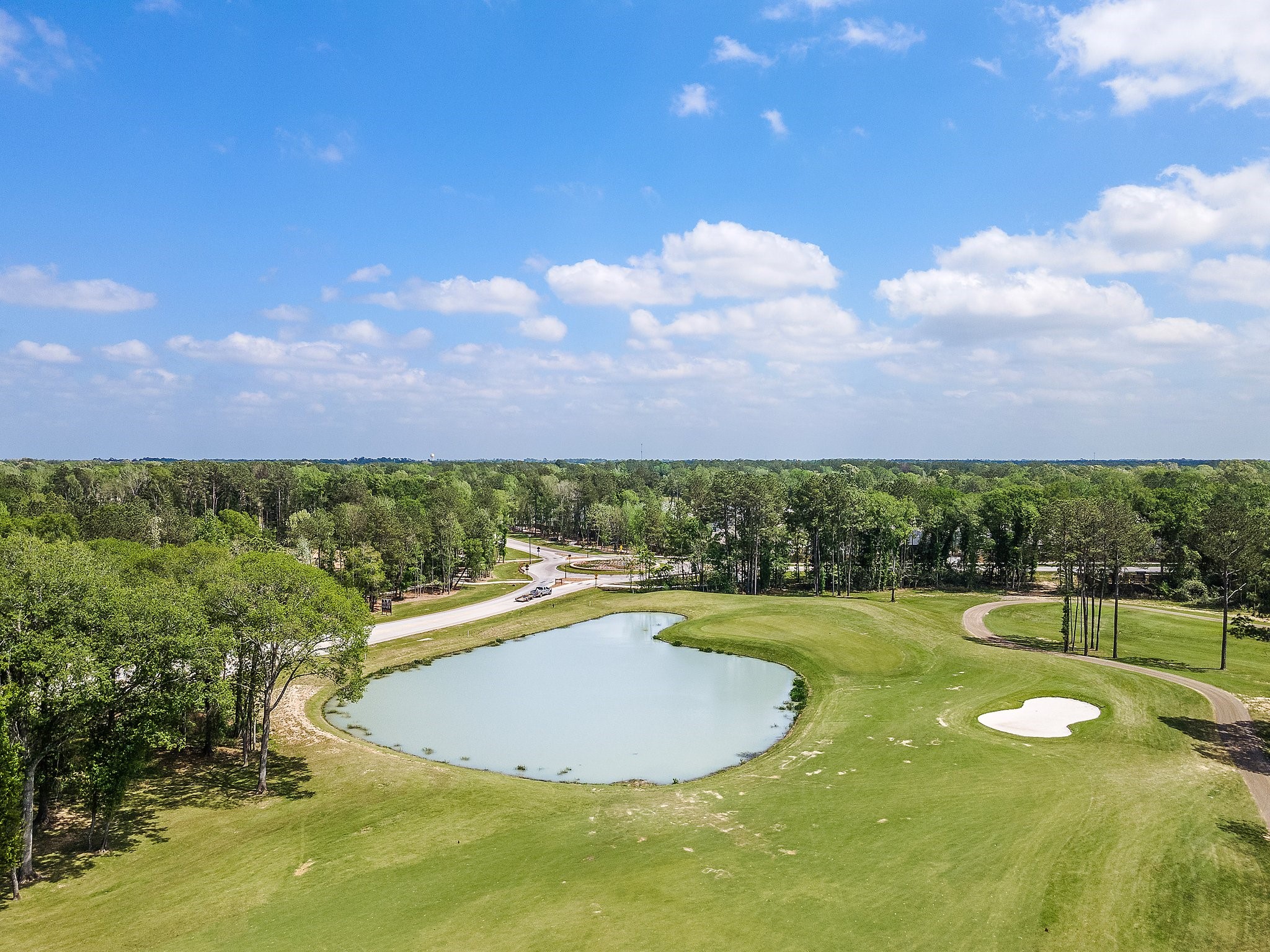 7551 Congress Trl Way Porter, TX 77365 - Photo 40 of 48 a view of a swimming pool with a yard and outdoor seating