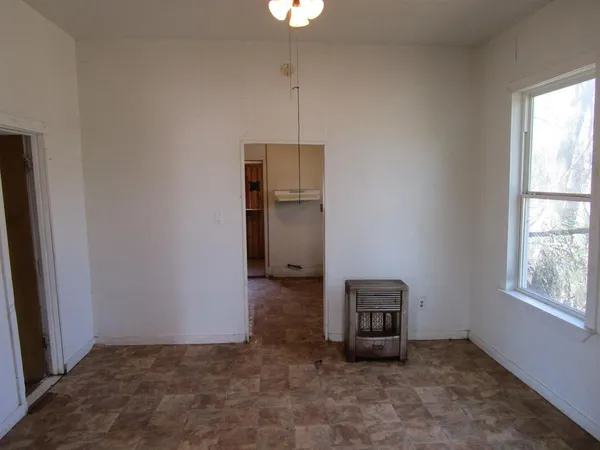 a view of a hallway with a window