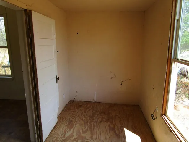 an empty room with windows