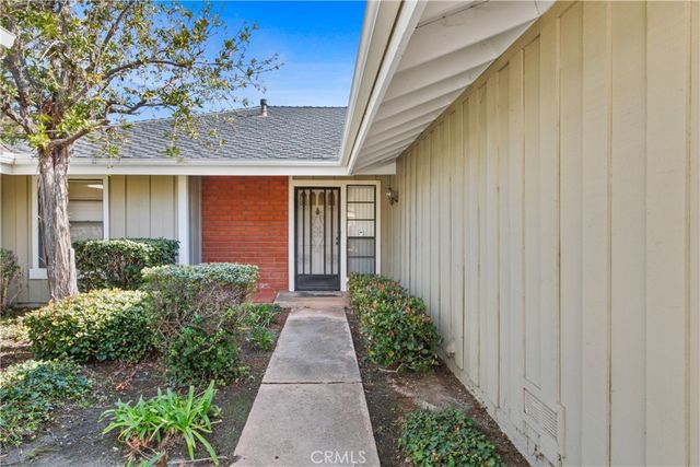 a front view of a house with a porch