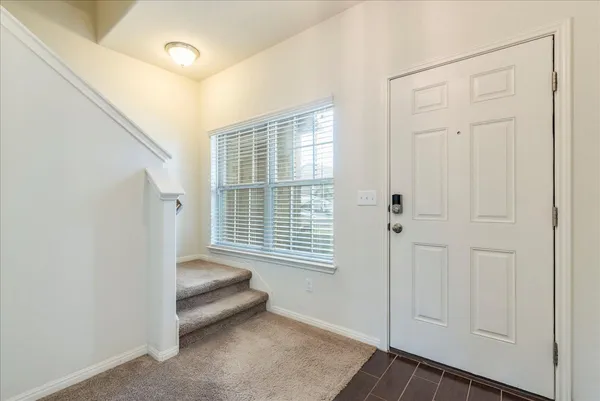a livingroom with a large window