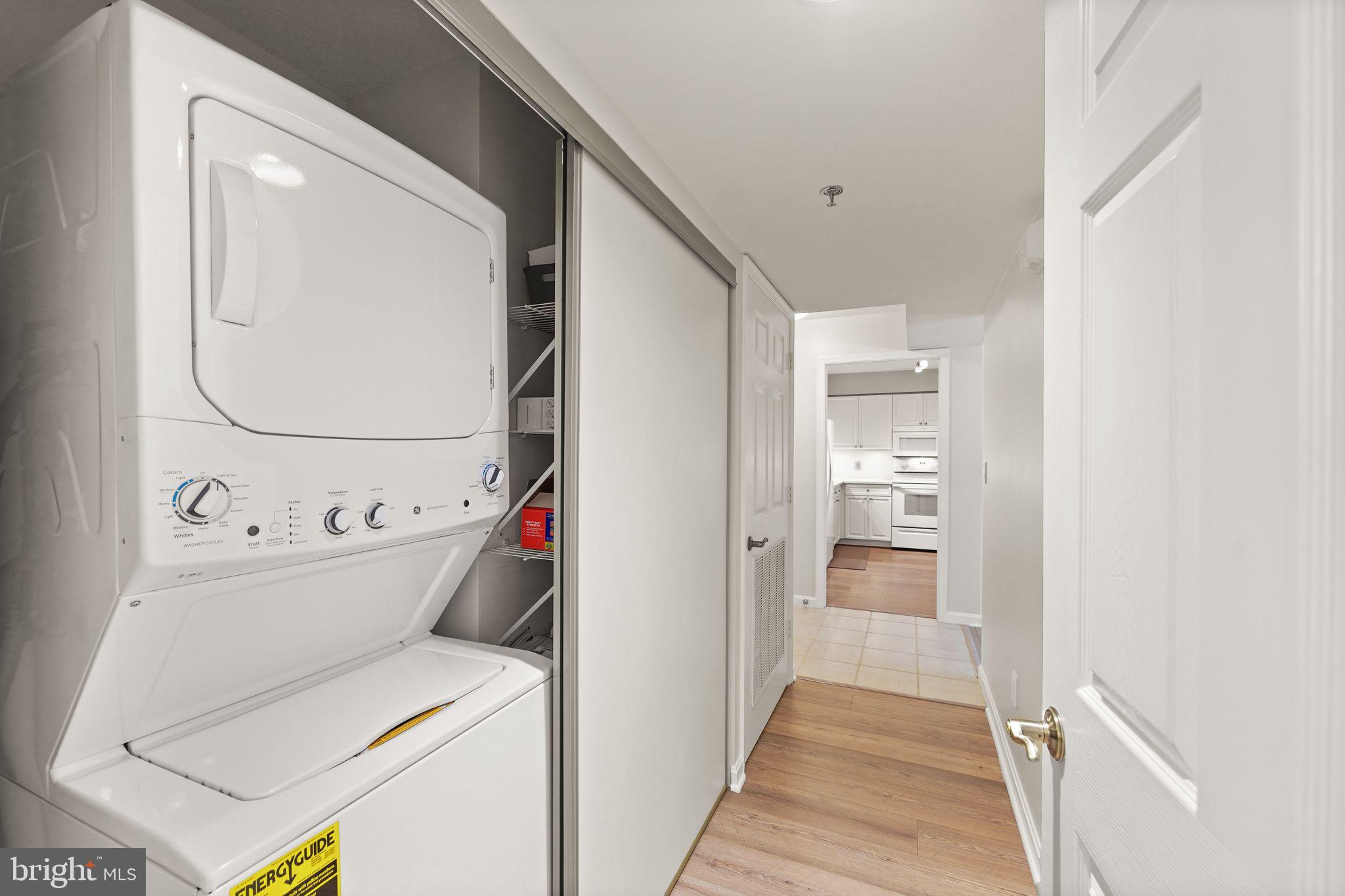 19385 Cypress Ridge Terrace, Unit 522 Leesburg, VA 20176 - Photo 30 of 33 a utility room with dryer and washer