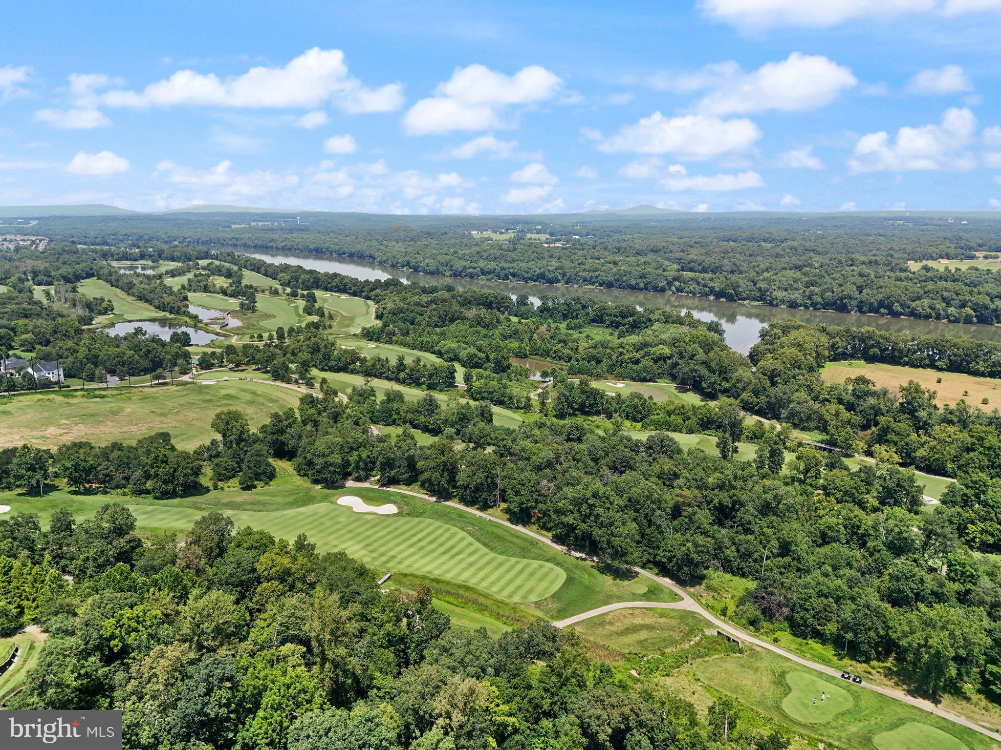 19385 Cypress Ridge Terrace, Unit 522 Leesburg, VA 20176 - Photo 32 of 33 a view of a city with lush green forest