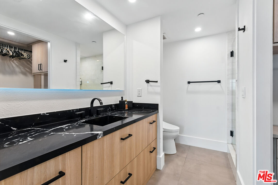 4211 Redwood Avenue, Unit 402 Los Angeles, CA 90066 - Photo 16 of 33 a close view of sink and a toilet