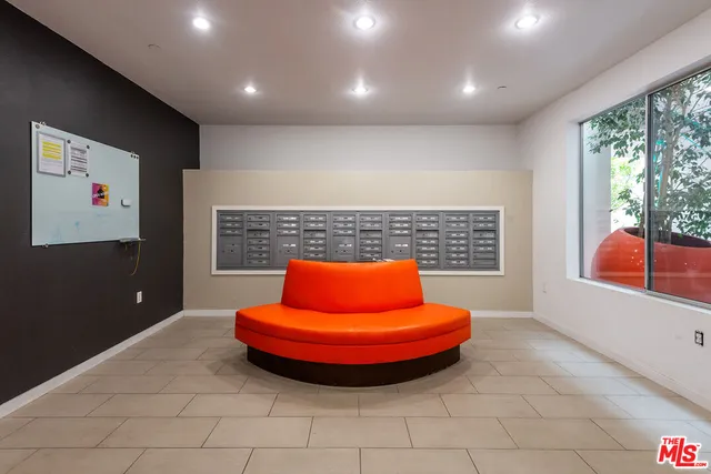 a view of a car parked in front of a building