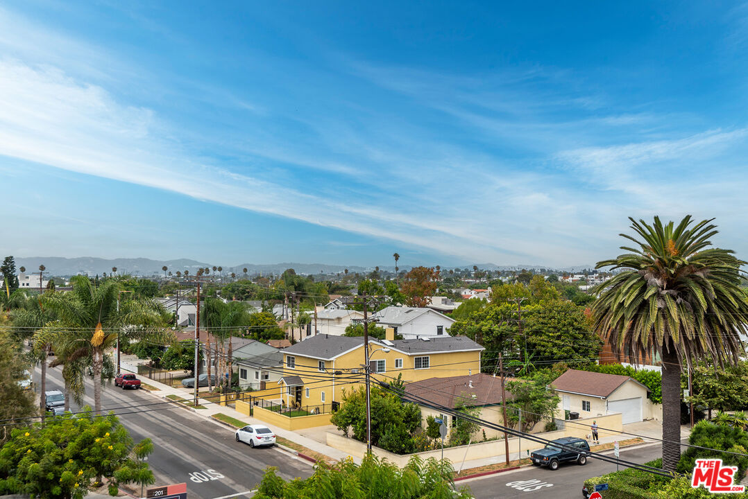 4211 Redwood Avenue, Unit 402 Los Angeles, CA 90066 - Photo 7 of 33 a city view with houses and lake view