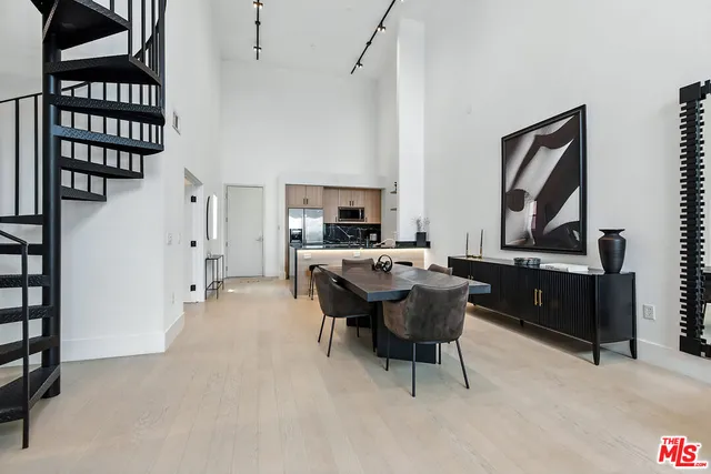 a view of a workspace with furniture