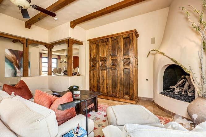 72275 Upper Way West Palm Desert, CA 92260 - Photo 37 of 90 a living room with furniture and a fireplace