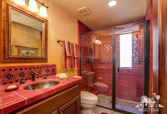 72275 Upper Way West Palm Desert, CA 92260 - Photo 66 of 90 a bathroom with a sink and a mirror