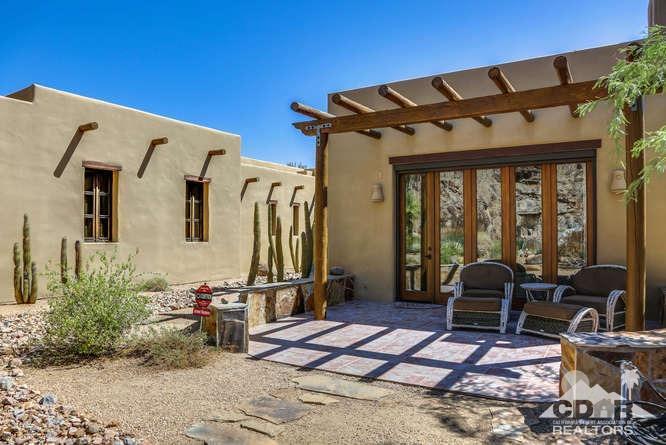 72275 Upper Way West Palm Desert, CA 92260 - Photo 72 of 90 a front view of a house with garden