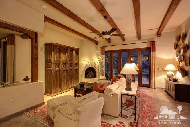 72275 Upper Way West Palm Desert, CA 92260 - Photo 88 of 90 a living room with furniture a rug and a fireplace