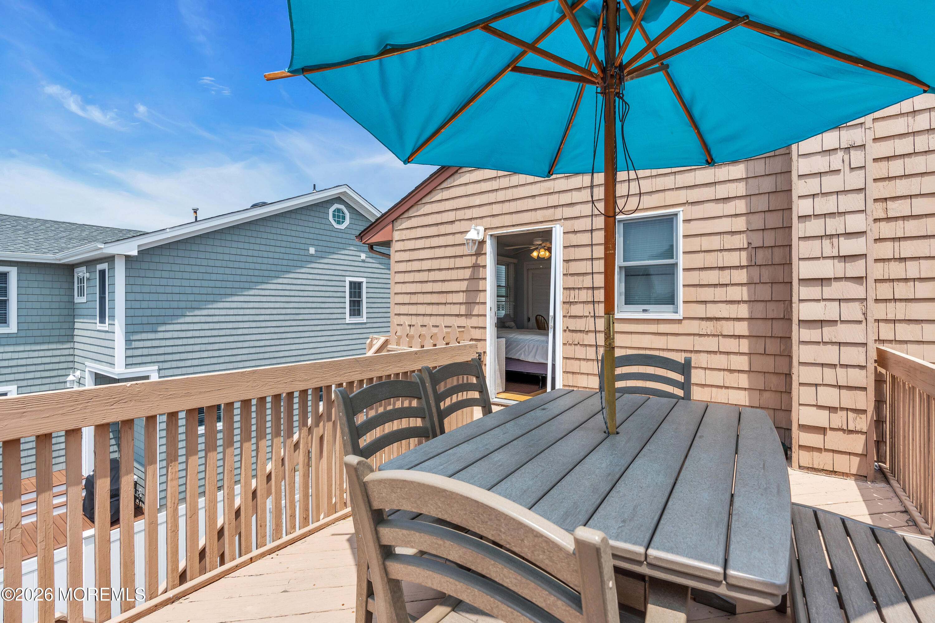 8 President Avenue, Unit 1 Lavallette, NJ 08735 - Photo 16 of 18 a view of wooden roof deck