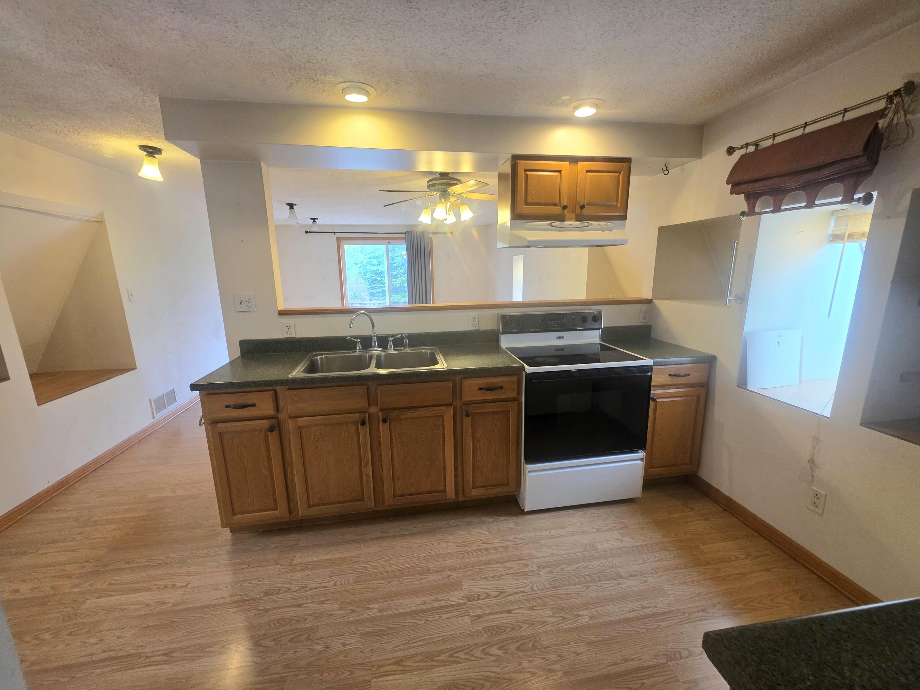 1402 Deaner Road Northeast Edmore, MI 48829 - Photo 9 of 17 Upper Kitchen