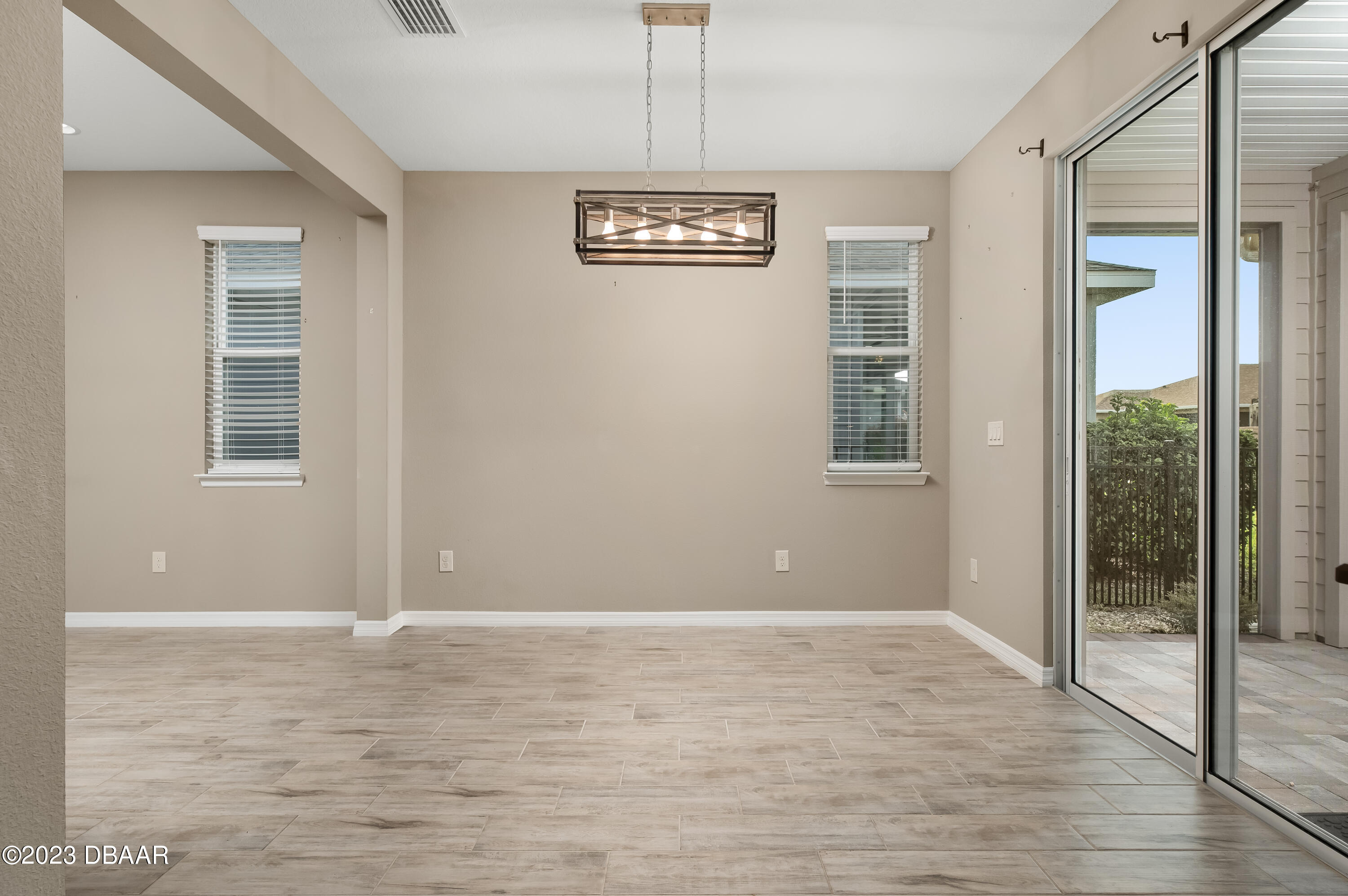 5658 Northwest 40th Loop Ocala, FL 34482 - Photo 20 of 80 a view of an empty room with a window