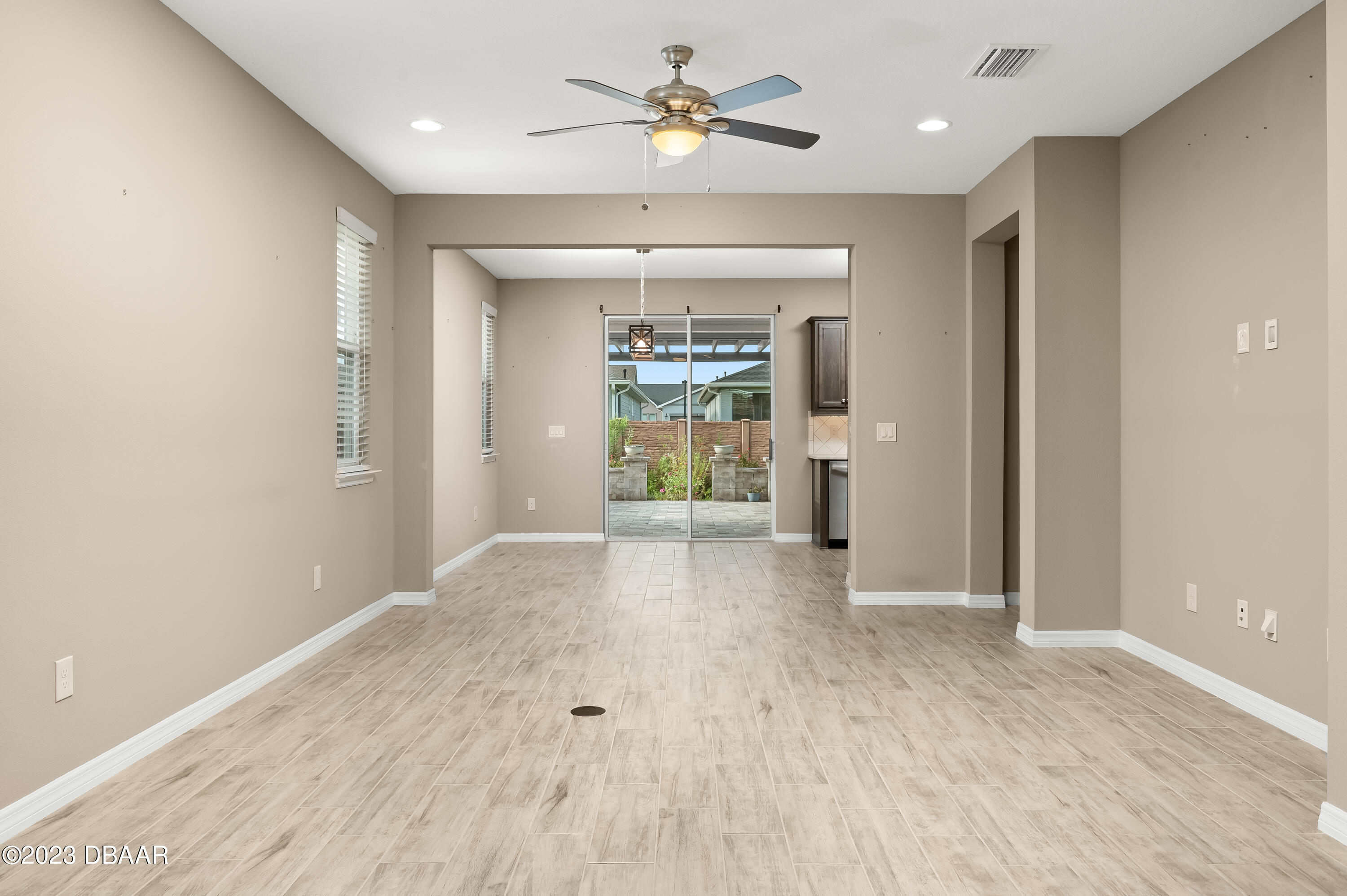 5658 Northwest 40th Loop Ocala, FL 34482 - Photo 27 of 80 wooden floor in an empty room with a window
