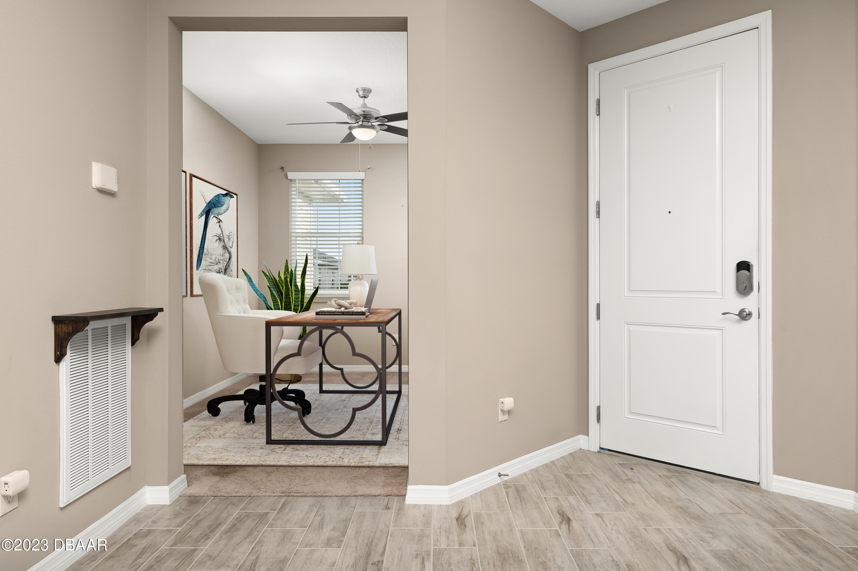 5658 Northwest 40th Loop Ocala, FL 34482 - Photo 28 of 80 a view of a livingroom with furniture and a table wooden floor