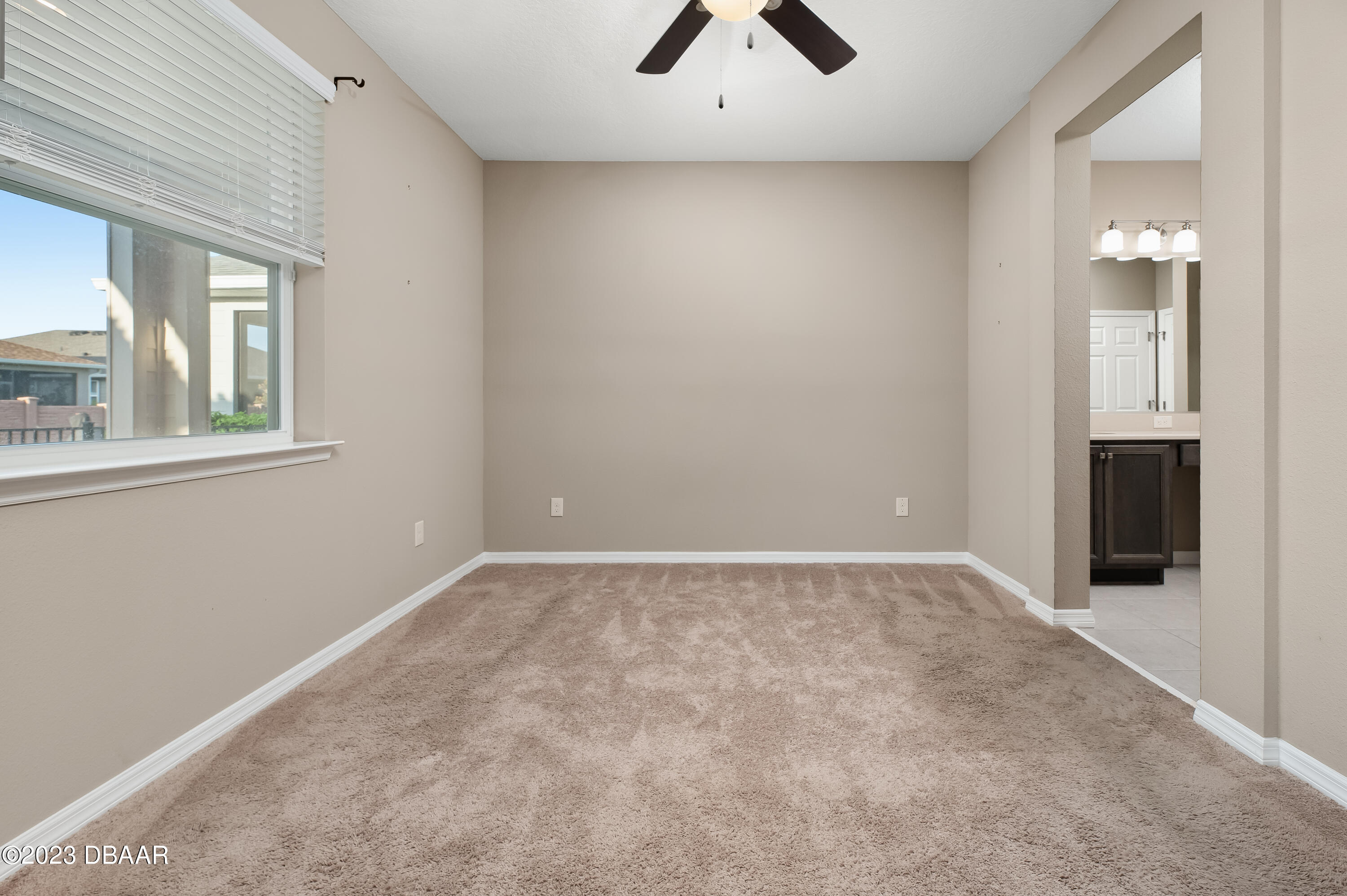 5658 Northwest 40th Loop Ocala, FL 34482 - Photo 37 of 80 an empty room with windows and closet