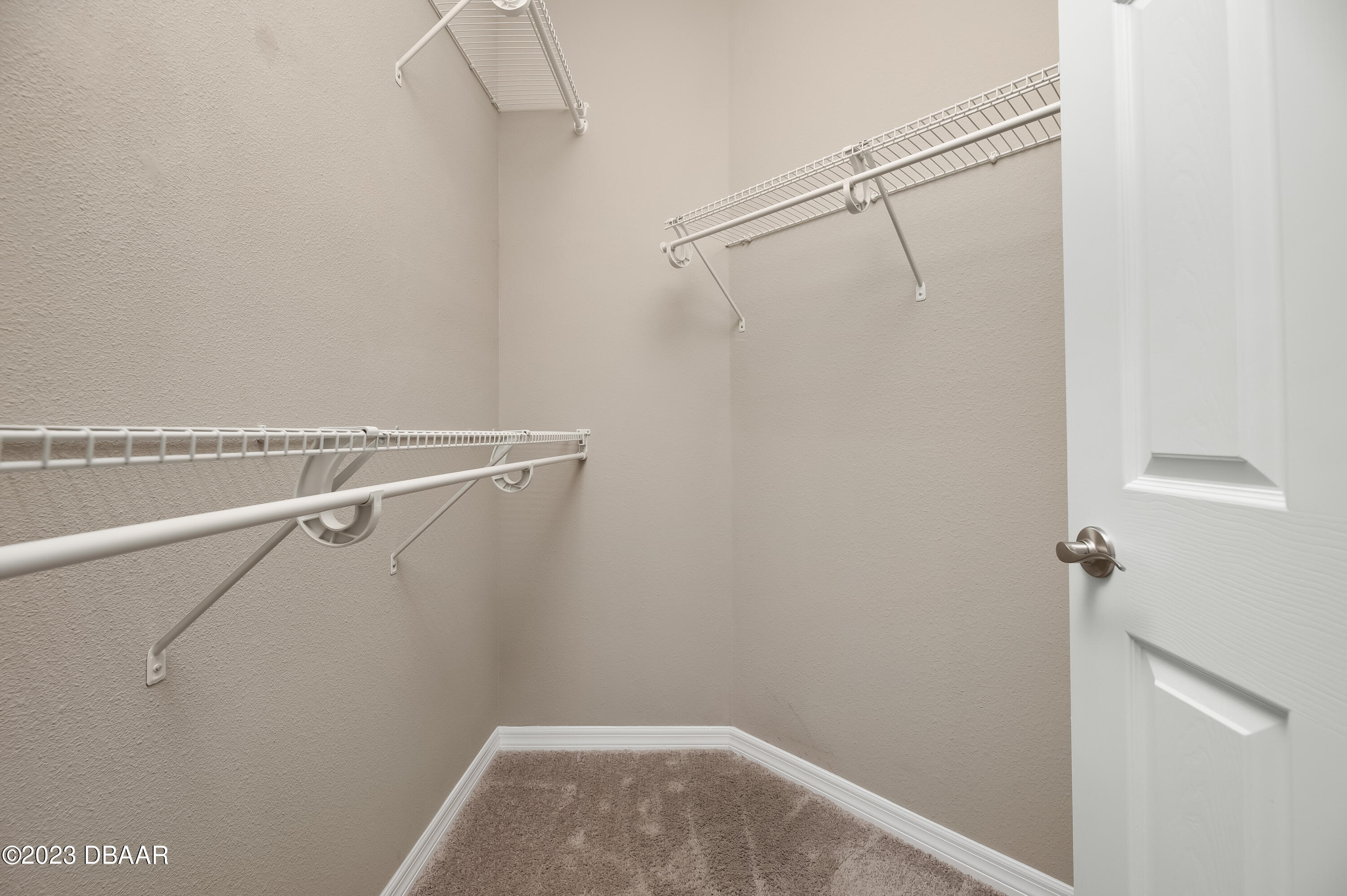 5658 Northwest 40th Loop Ocala, FL 34482 - Photo 40 of 80 a view of a room with racks on the wall