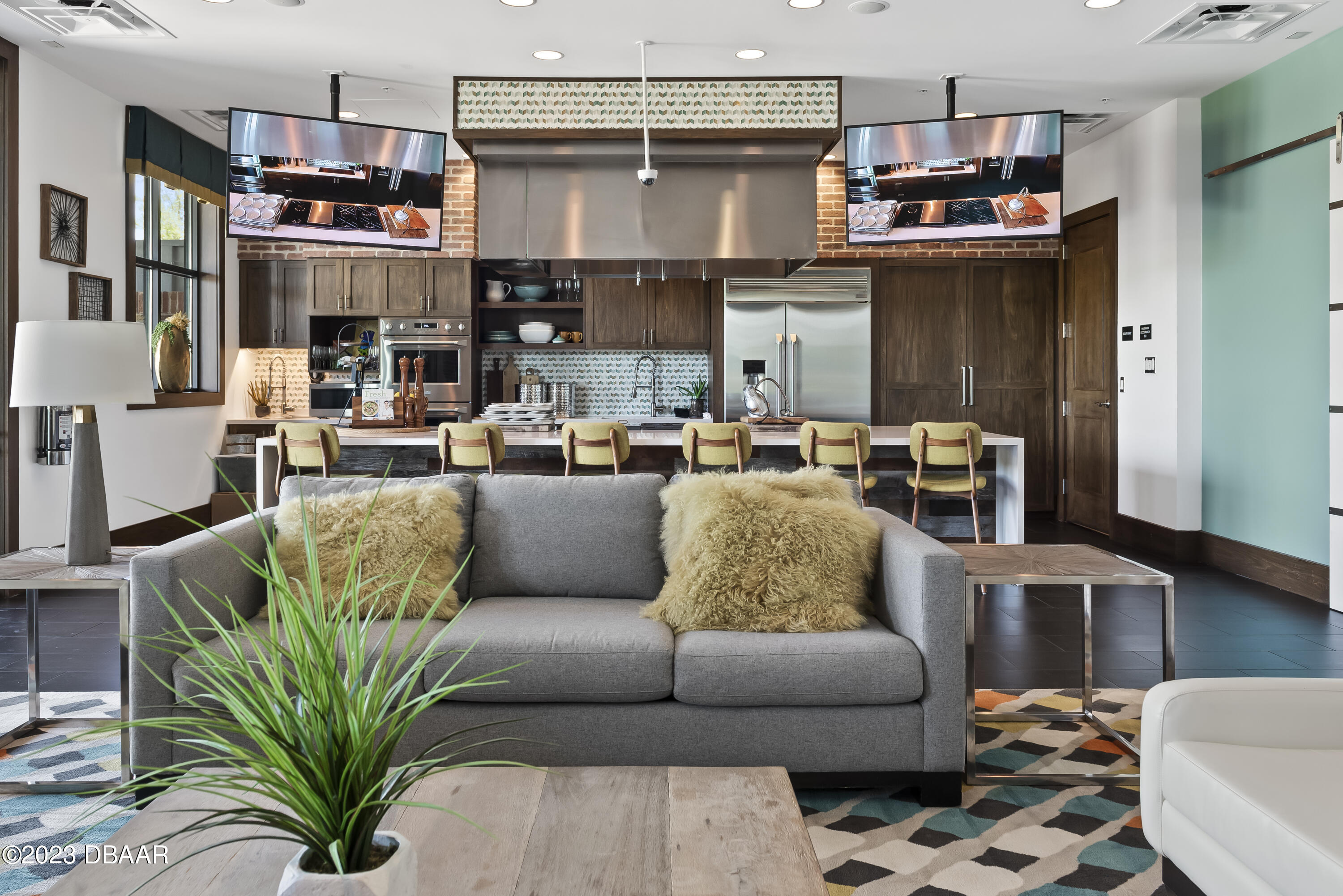 5658 Northwest 40th Loop Ocala, FL 34482 - Photo 66 of 80 a living room with furniture a fireplace and a chandelier