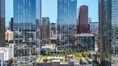 a view of a city with tall buildings