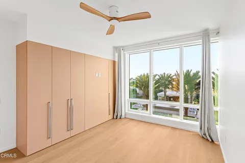 a view of a room with a large window
