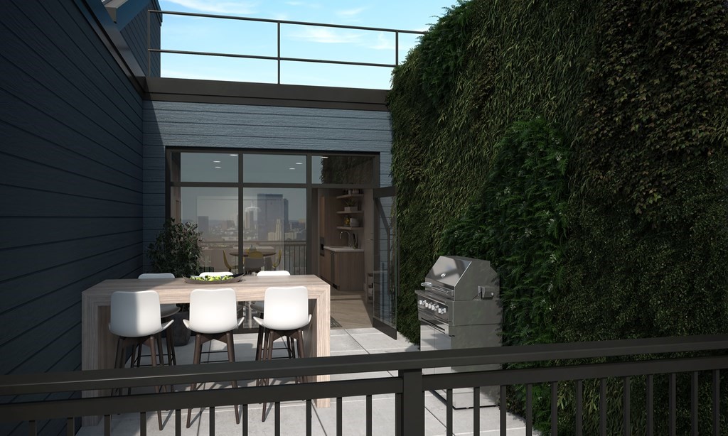 30 Penniman Road, Unit 307 Boston, MA 02134 - Photo 8 of 10 a view of a chairs and table in patio