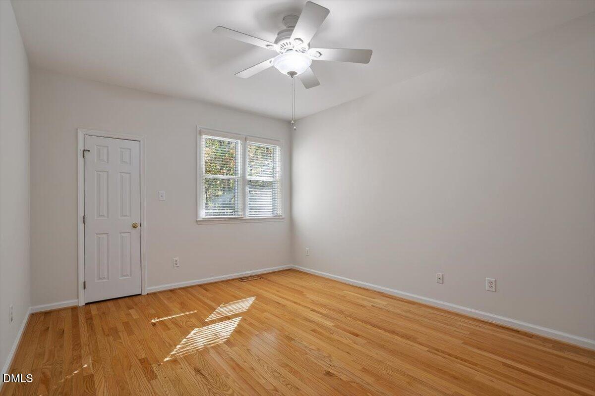 117 Colchis Court Cary, NC 27513 - Photo 22 of 39 a view of a room with a fan