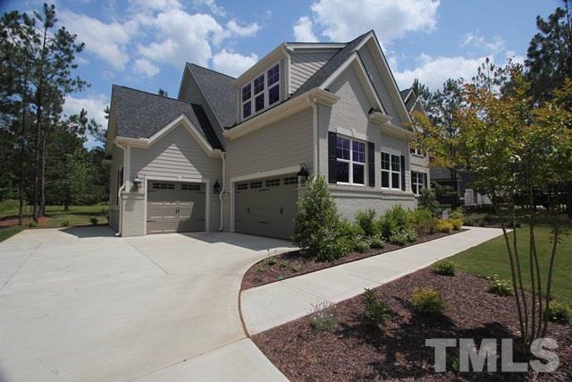 1221 Harrison Ridge Road Wake Forest, NC 27587 - Photo 2 of 25 a front view of a house with a yard