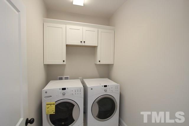 1221 Harrison Ridge Road Wake Forest, NC 27587 - Photo 21 of 25 a utility room with dryer and washer