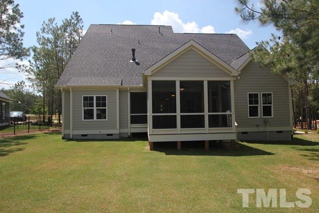 1221 Harrison Ridge Road Wake Forest, NC 27587 - Photo 24 of 25 a view of a house with garden