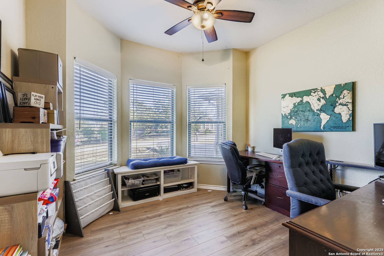 118 Santa Fe Seguin, TX 78155 - Photo 18 of 44 a livingroom with workspace fireplace and dining area