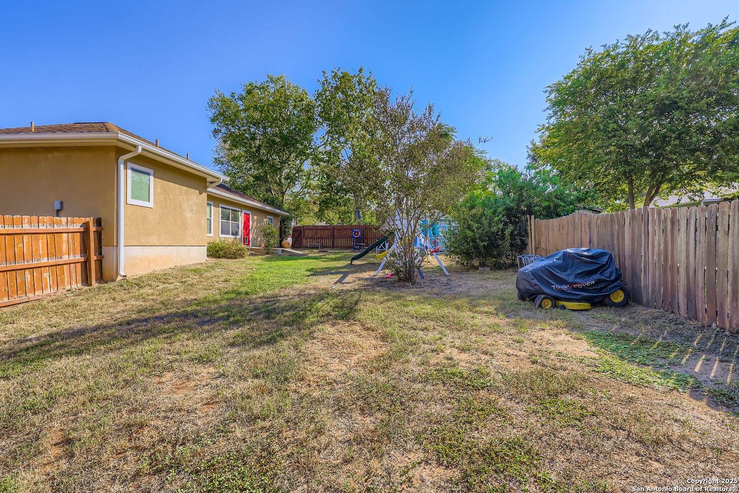 118 Santa Fe Seguin, TX 78155 - Photo 29 of 44 a backyard of a house with barbeque oven table and chairs
