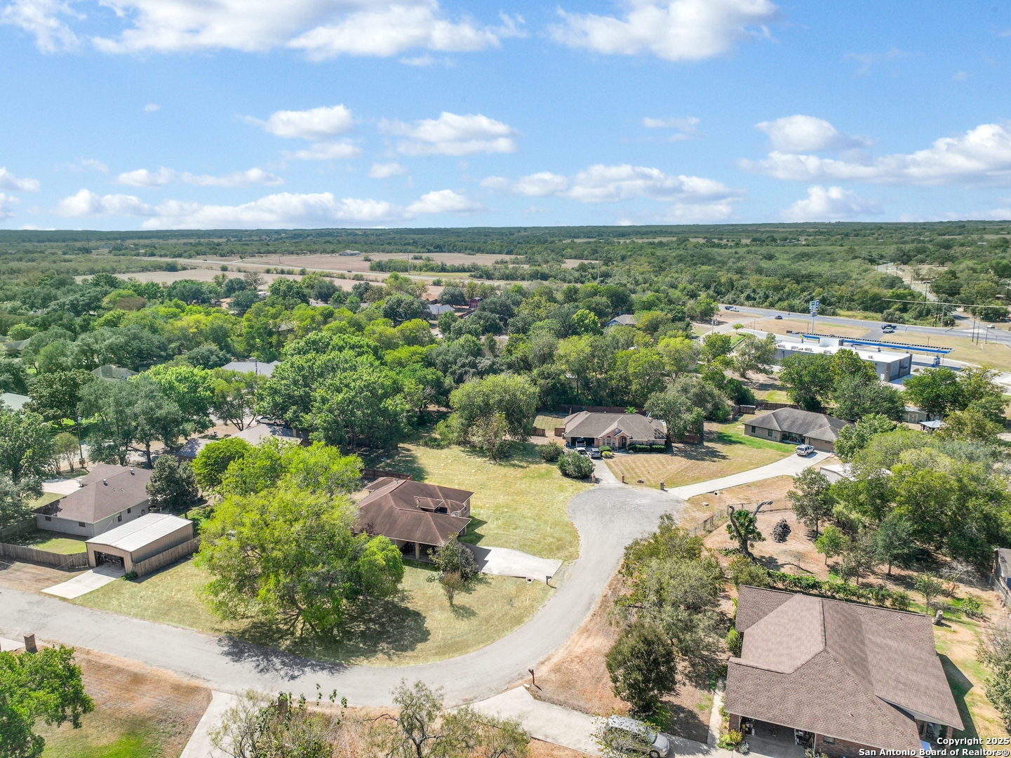 118 Santa Fe Seguin, TX 78155 - Photo 3 of 44 an aerial view of a houses with outdoor space and a lake view in back