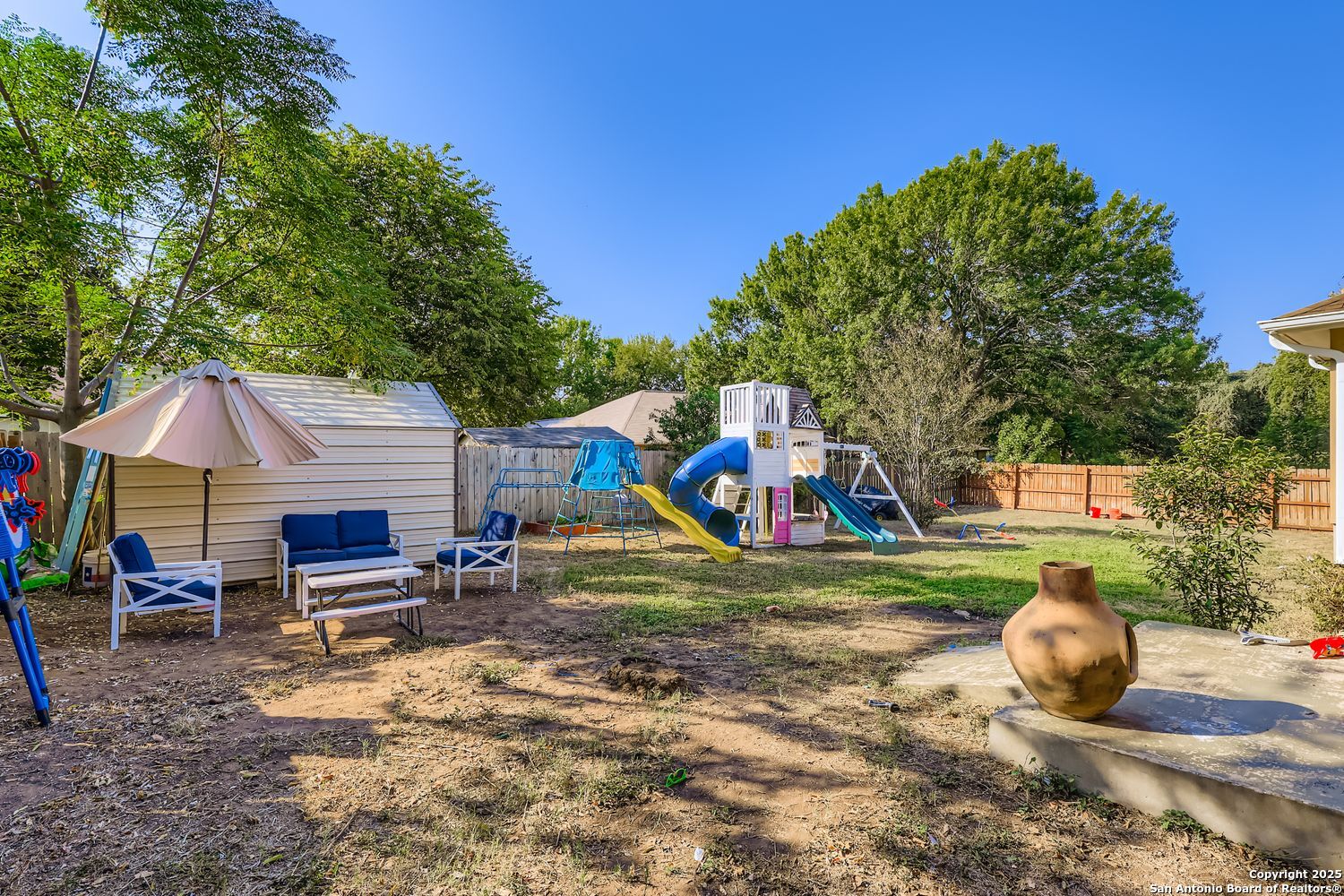 118 Santa Fe Seguin, TX 78155 - Photo 31 of 44 a view of a backyard with table and chairs