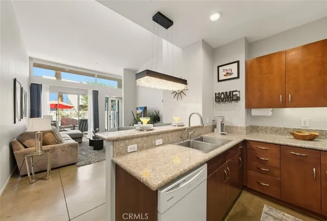 a kitchen with a table and chairs in it