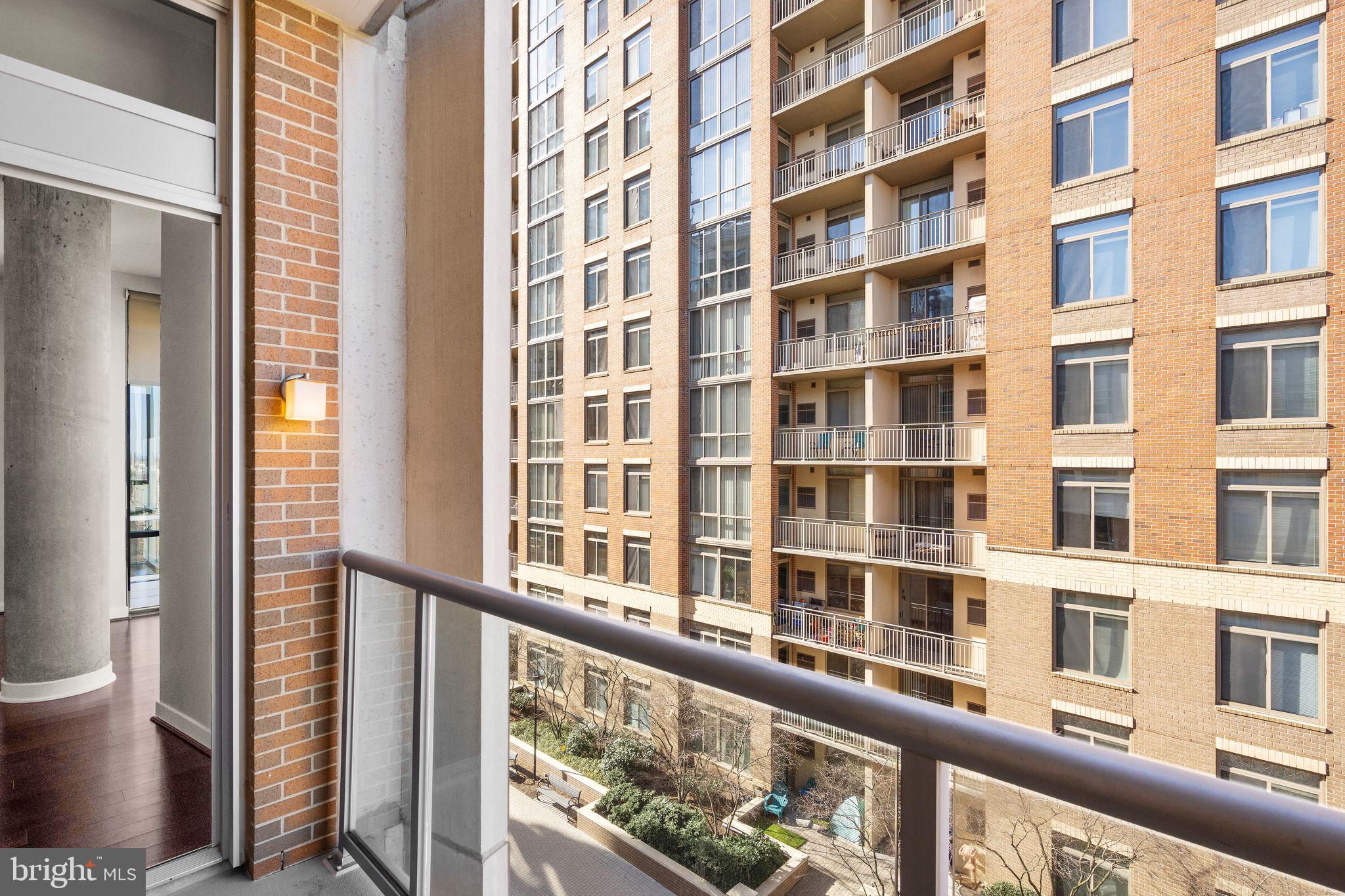 12025 New Dominion Parkway, Unit 406 Reston, VA 20190 - Photo 18 of 31 a view of a building from a balcony