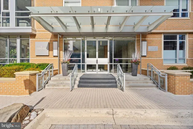 front view of a house with a large window