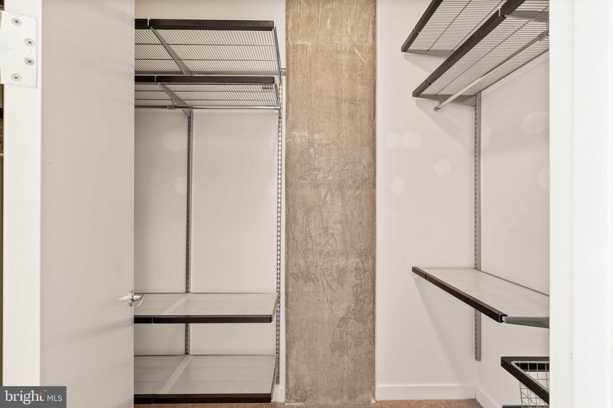 12025 New Dominion Parkway, Unit 406 Reston, VA 20190 - Photo 25 of 31 a view of staircase with white walls