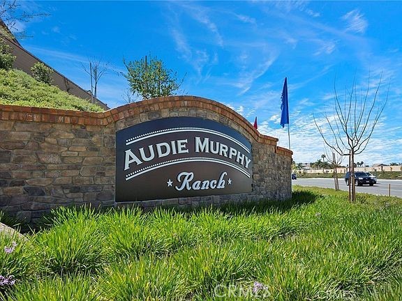 29901 Bridlegate Way Menifee, CA 92584 - Photo 37 of 43 a view of a park that has a sign board
