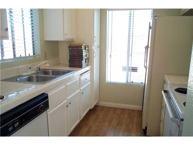 868 South Rancho Santa Fe Road, Unit H San Marcos, CA 92078 - Photo 3 of 8 Kitchen with frig & electric stove