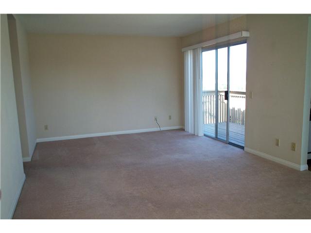 868 South Rancho Santa Fe Road, Unit H San Marcos, CA 92078 - Photo 4 of 8 Living room when it was vacant