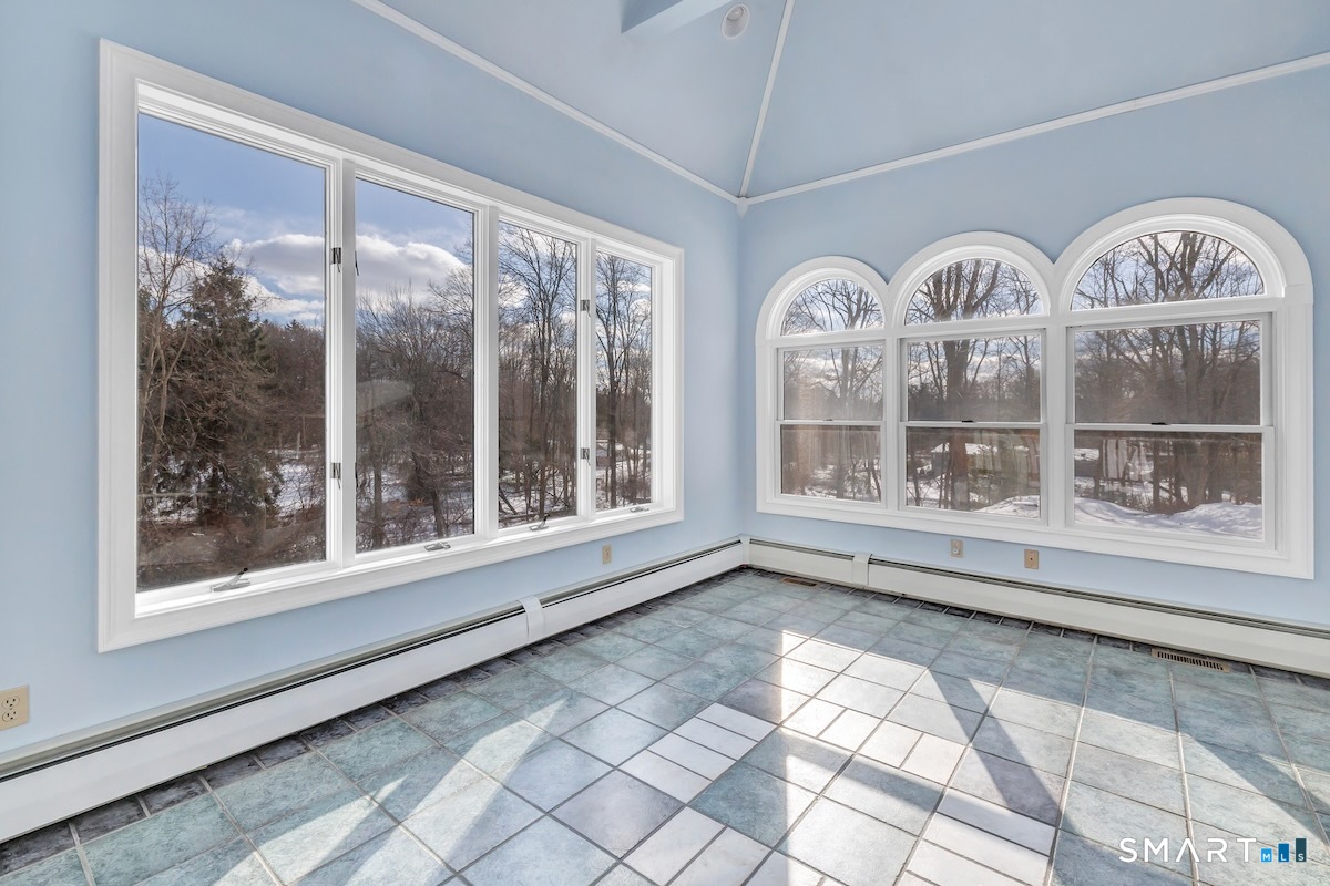 461 Amity Road Woodbridge, CT 06525 - Photo 25 of 40 a view of front door with wooden floor