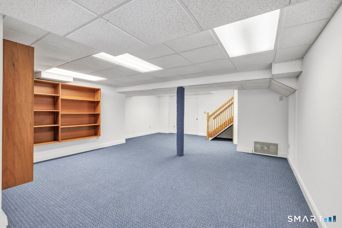 461 Amity Road Woodbridge, CT 06525 - Photo 35 of 40 a view of an empty room with a window