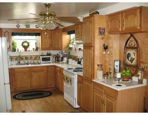 227 Van Meter Road Smithton, PA 15479 - Photo 3 of 8 Kitchen. This gorgeous oak kitchen has plenty of cabinets and counterspace. A cook s dream!