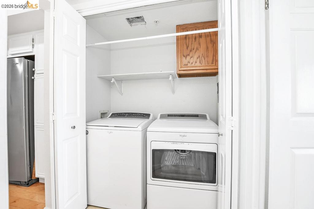 3487 Wells Road Oakley, CA 94561 - Photo 17 of 30 Laundry area with washing machine and dryer