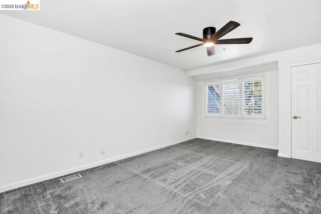 3487 Wells Road Oakley, CA 94561 - Photo 22 of 30 Unfurnished room with carpet floors and a ceiling fan